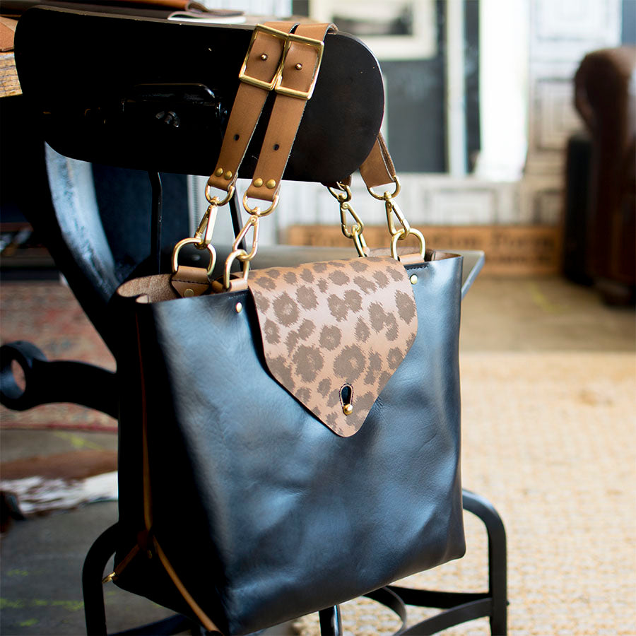 Three-Way Bag — detail showing zipper closure and pull tab