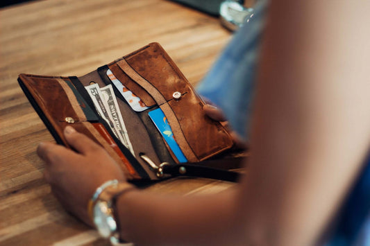 Dime Wristlet — hero shot showing two-tone Horween leather wristlet with pen loop