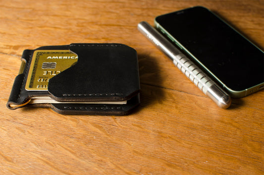 Money Clip — detail showing spring clip mechanism and leather wrap