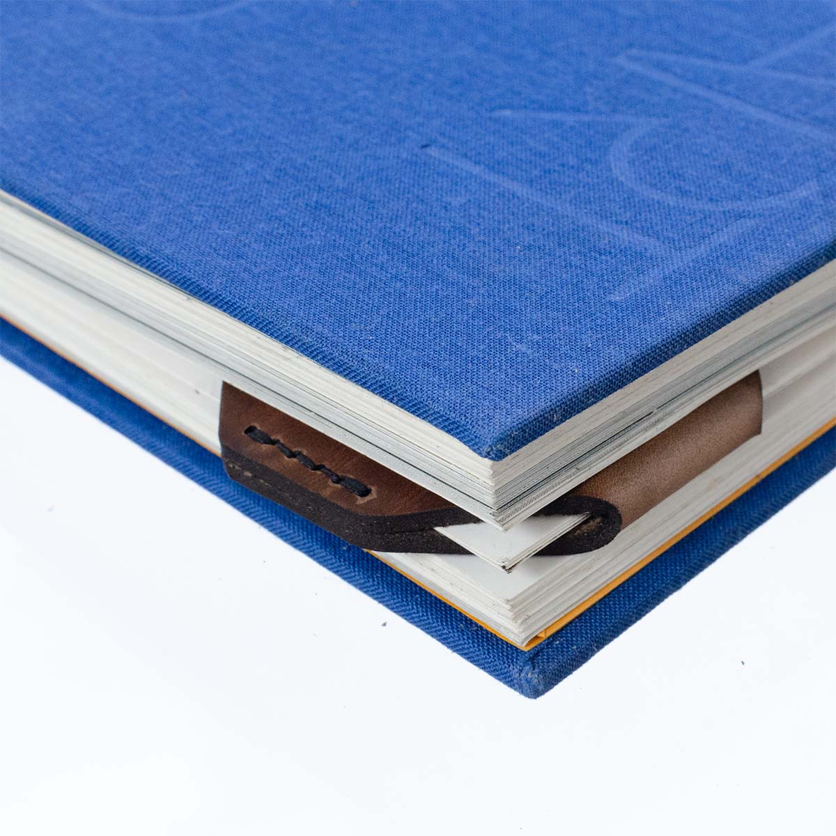 FFF Corner Bookmark — lifestyle shot showing bookmark in hardcover book