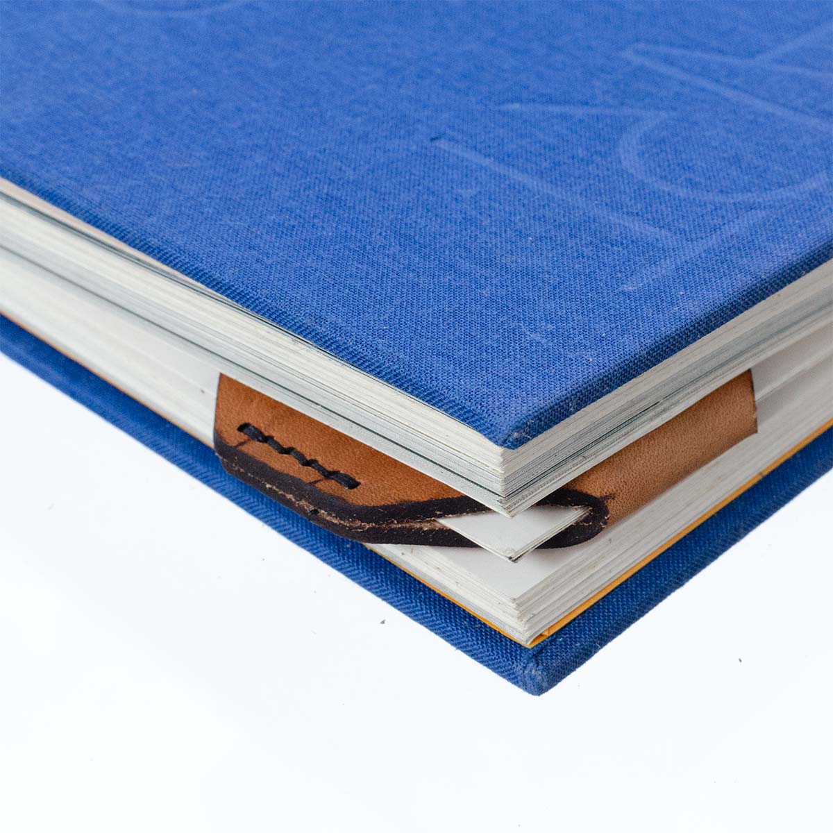 FFF Corner Bookmark — lifestyle shot showing bookmark in paperback
