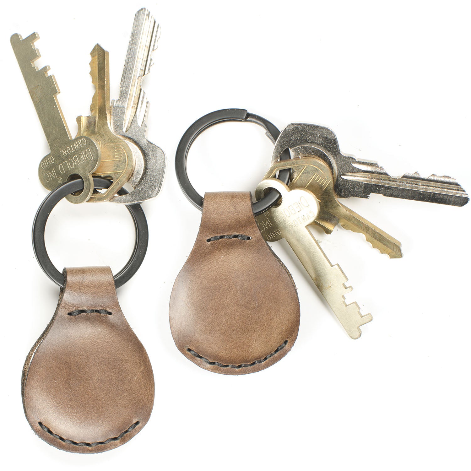 AirTag FFFob Key Ring — hero shot showing Horween leather AirTag holder with key ring