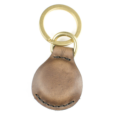 AirTag FFFob LayFlat — detail showing AirTag slot in flat leather design