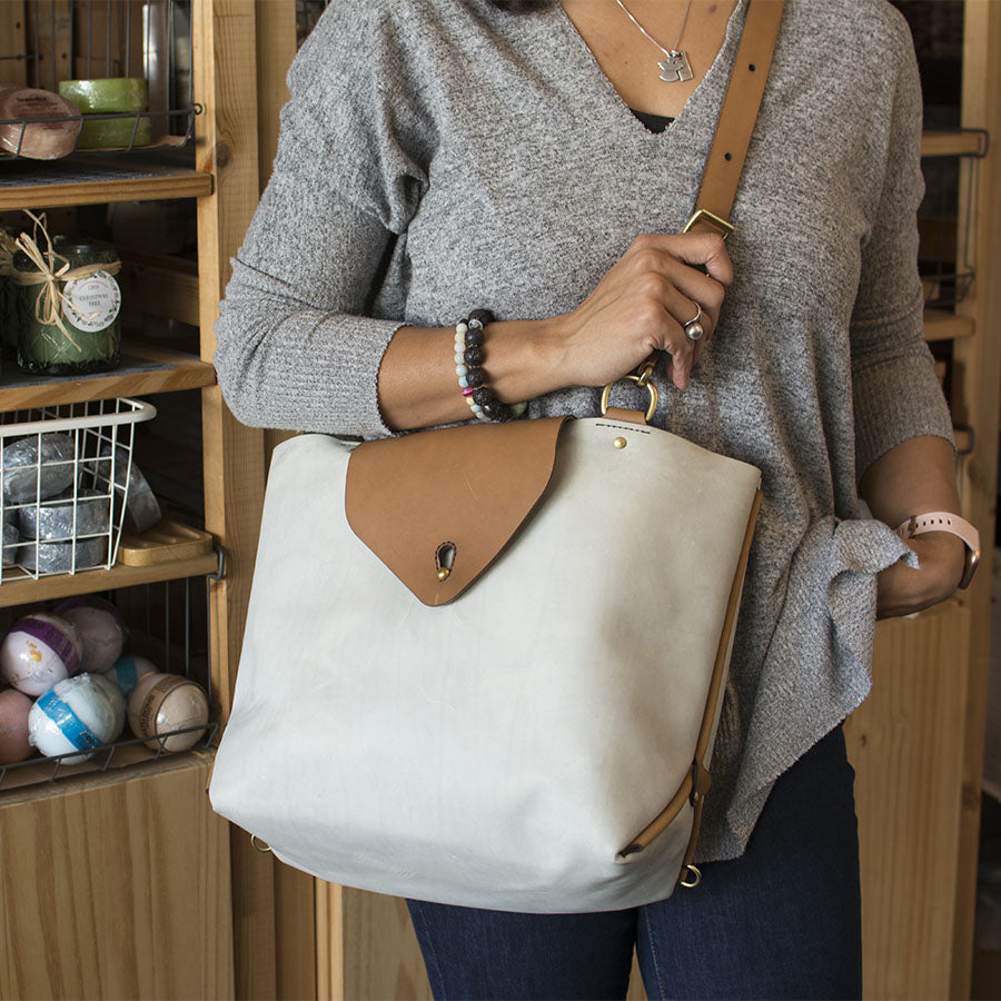 Three-Way Bag — detail showing top handle and zipper hardware