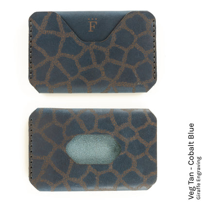 Side Hustle Wallet in Veg Tan Cobalt Blue with giraffe print lining — front view
