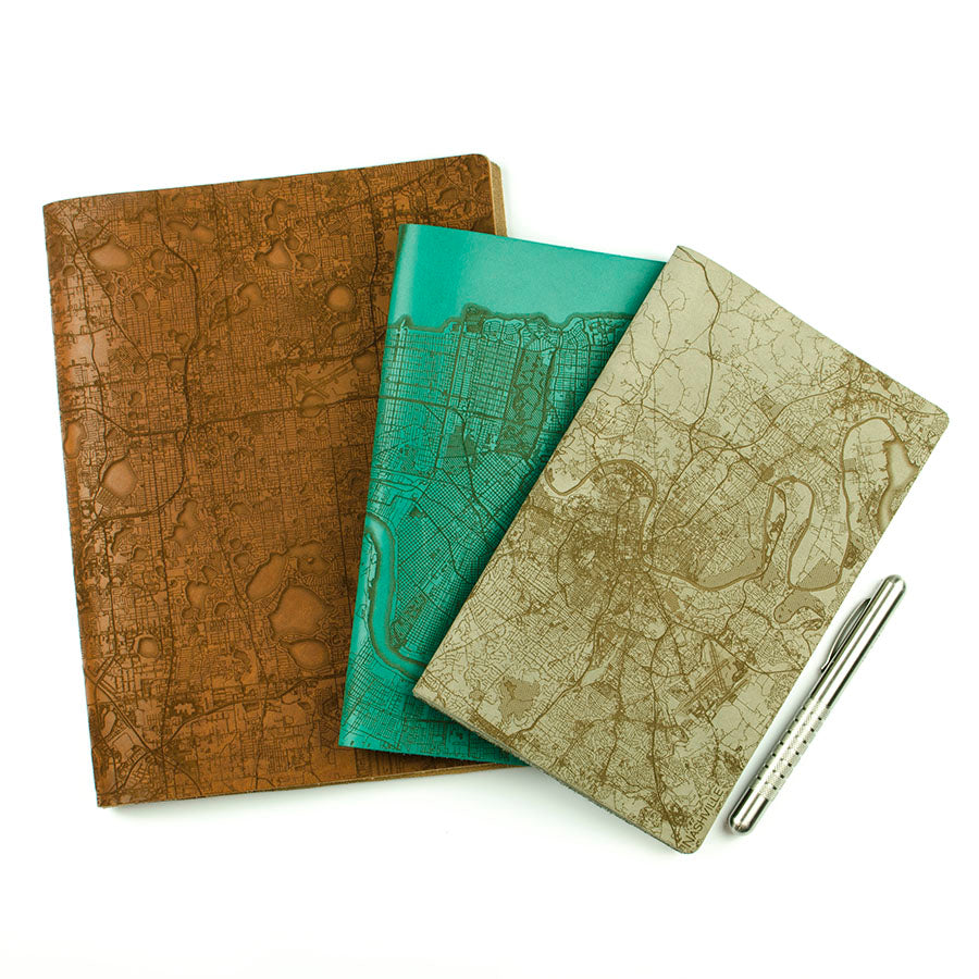 Slip Notebook Cover City Series — hero shot showing laser city map engraved Horween leather cover