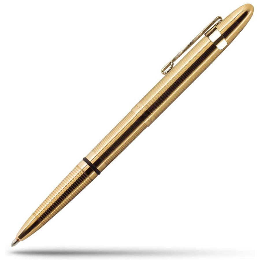 Fisher Space Pen — lifestyle shot showing pen with leather wallet or notebook