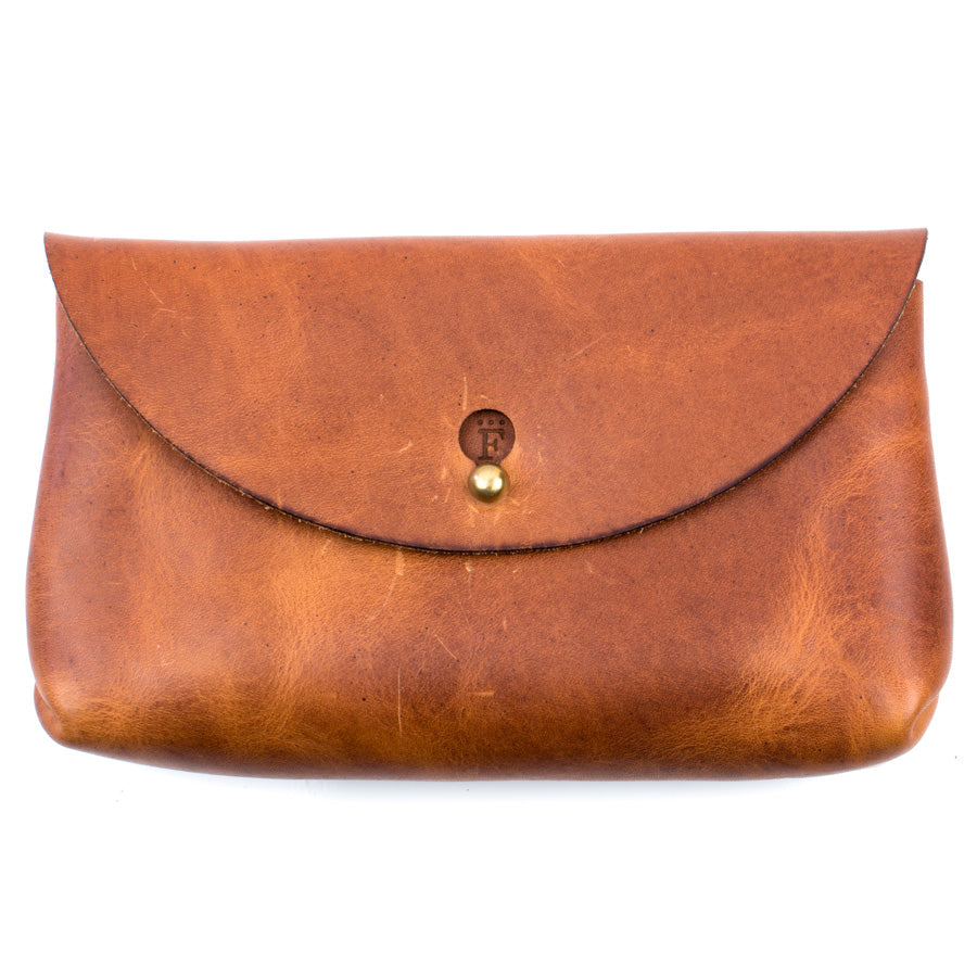 Penney Clutch in Veg Tan Dublin Ale — front view
