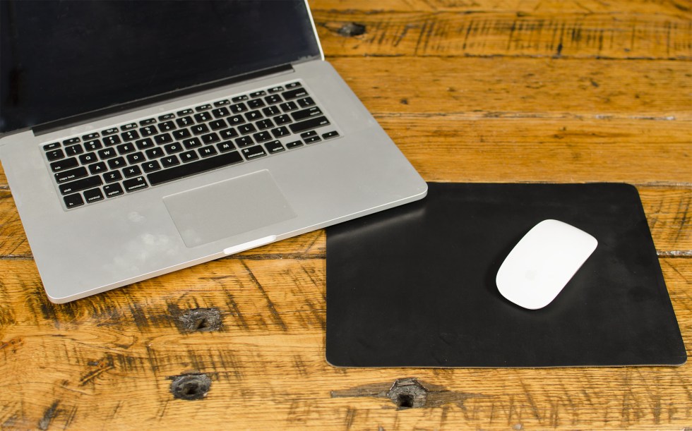 FFF Mouse Pad — detail showing leather surface and stitched border