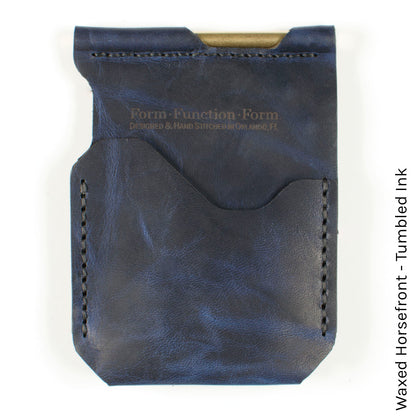 Money Clip — angle view showing clip spring and leather wrap
