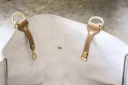 Three-Way Bag — hero shot showing convertible leather bag in Chromexcel Black