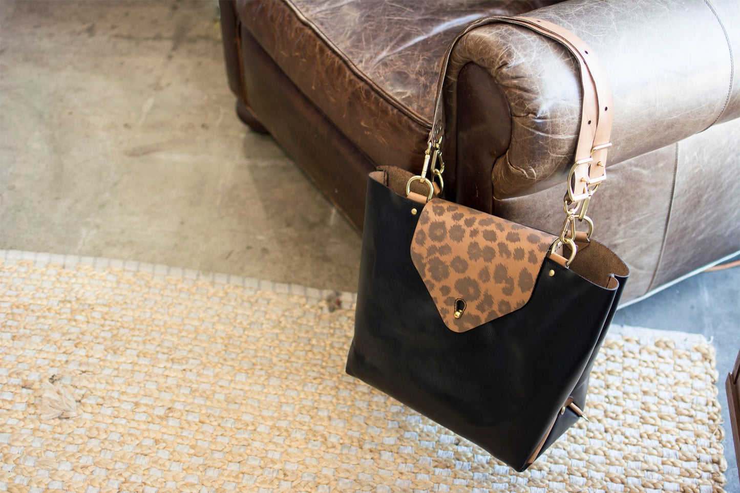 Three-Way Bag — detail showing convertible strap system and hardware
