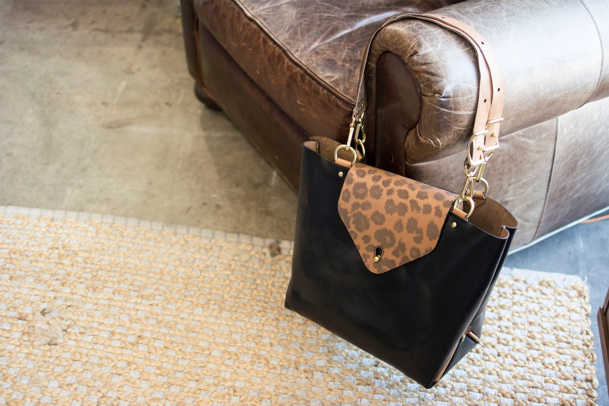 Three-Way Bag — detail showing convertible strap system and hardware