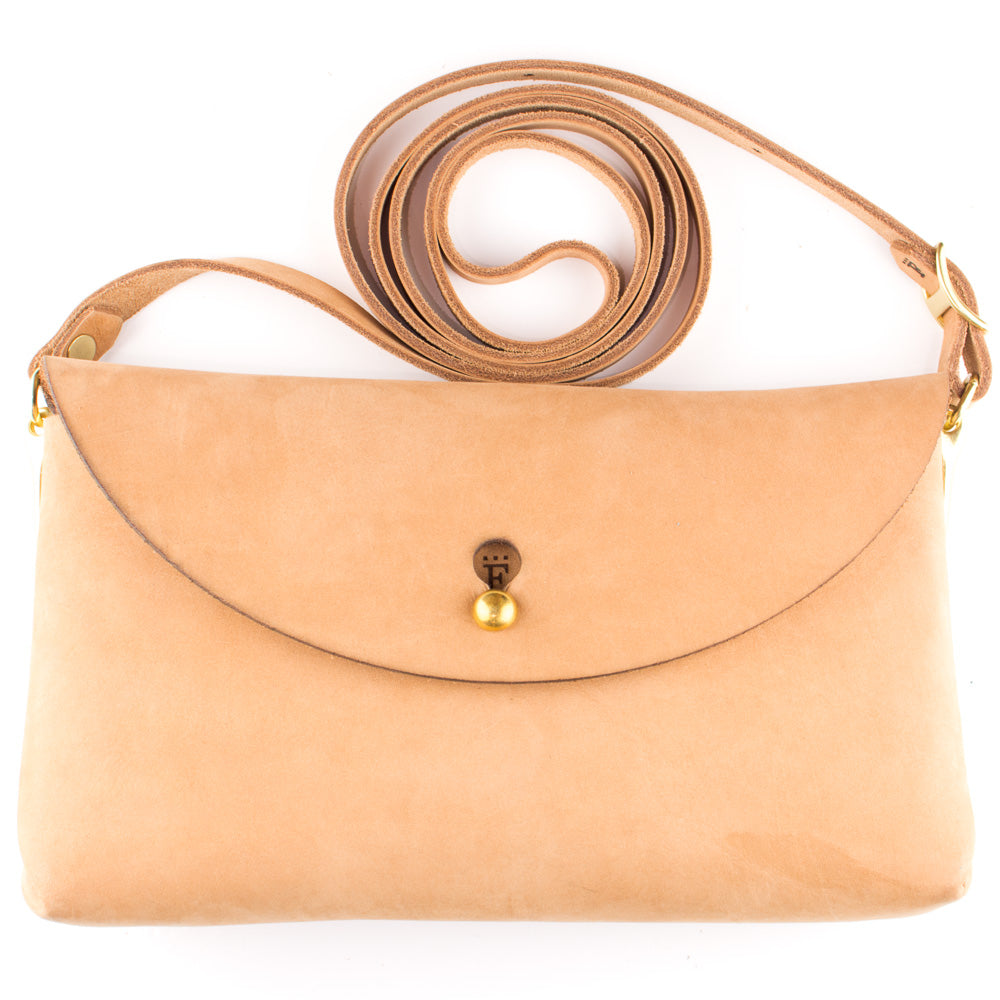 Penney Clutch — detail showing snap closure and leather grain