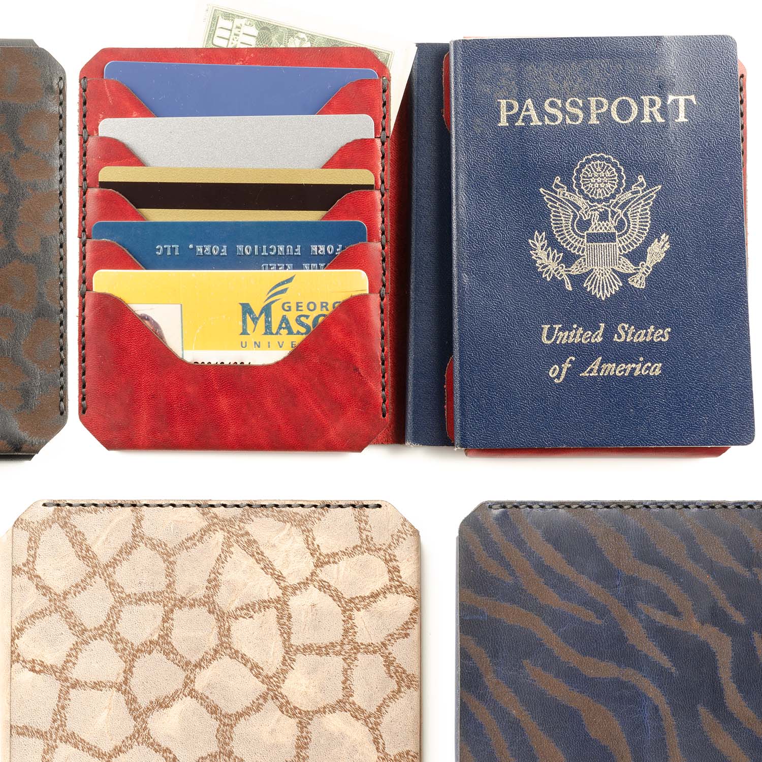 JetSet Passport Wallet — hero shot showing multiple color options in Horween leather