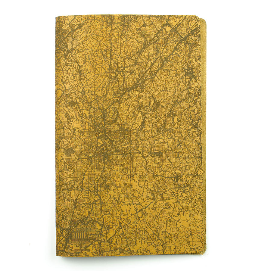 Slip Notebook Cover City Series — lifestyle shot with journal in cover